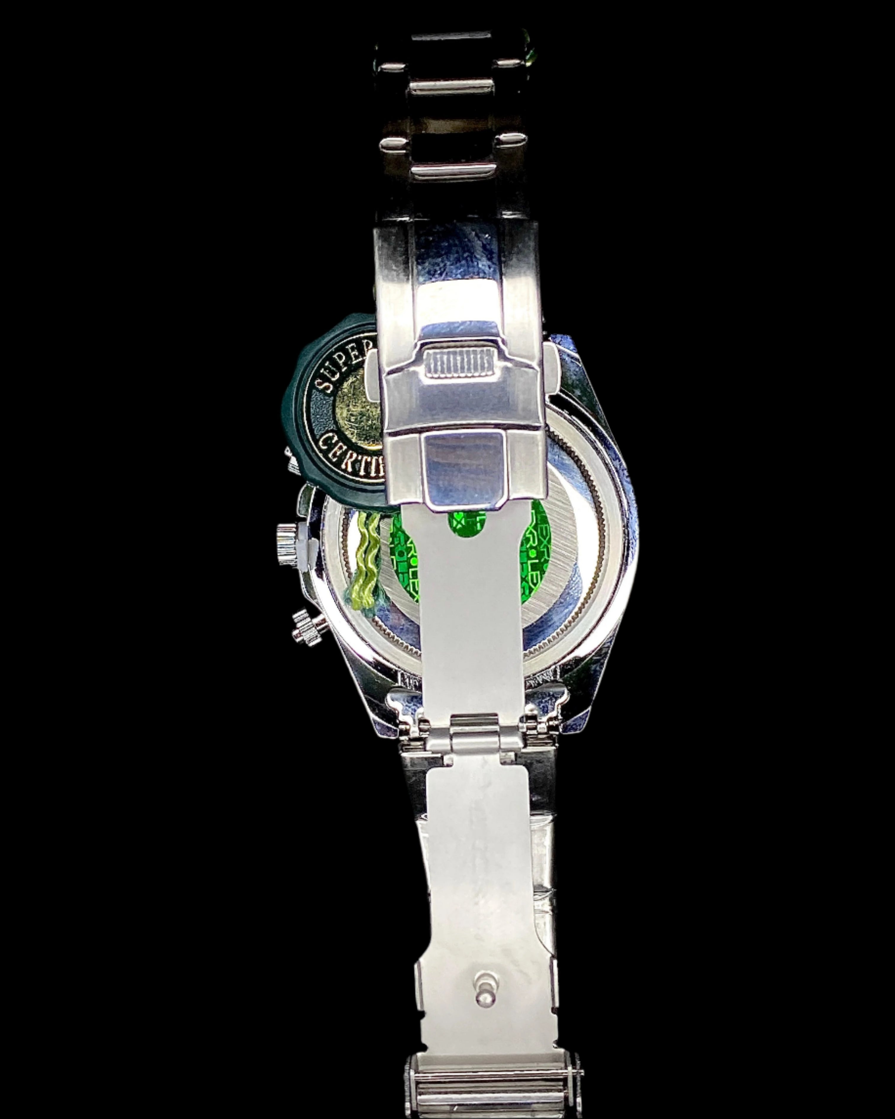 Silver watch with a clear face on a black background